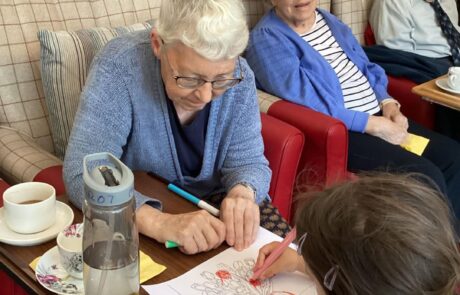 colouring activities with residents on ridgmont road's visit